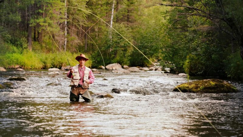 fly fisher at the river